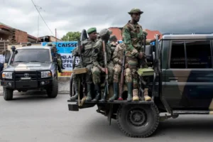Members of the M23 rebel group mount their vehicles in Goma, North Kivu province in the East of the Democratic Republic of Congo on April 7, 2025